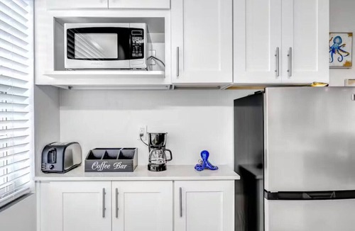 Coral Ridge Apartment | Coastal unit .5 miles to Beach!
