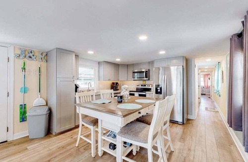 Montego Bay House | Comfortable home near beach with screened porch, pool, tennis, & mini-golf