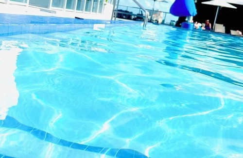 Hollywood Condo | CONDO@Hollywood BEACH ✦Rooftop POOL and HOT Tub ✦STEPS to BEACH ✦PET Friendly!
