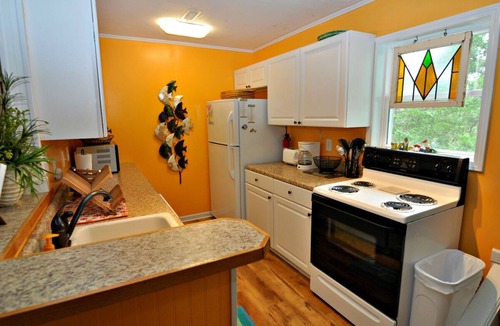 Ocracoke House | Contentment: Spacious home, den, screened porch, marsh views.