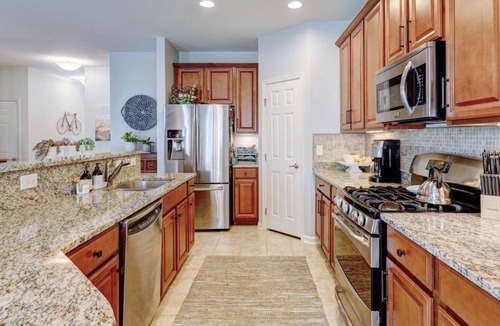 Lewes House | Convenient Lewes location with fenced yard, game room and huge community pool!