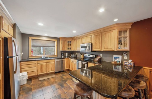 North Creek House | Covered Heated Pool + Rec Lounge | North Creek Stay | Lies by AvantStay
