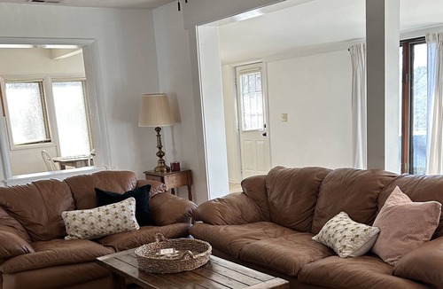 Hood Cottage | Cozy cottage tucked away in the woods with river+ mountain views- pet friendly!