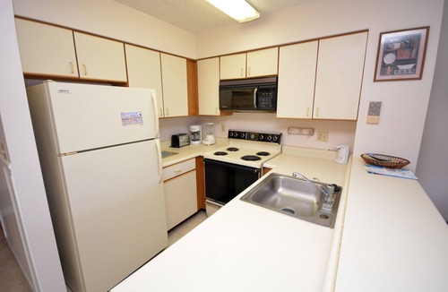 North Ocean City Condo | Cozy, inviting 1 bedroom condo with an outdoor pool and gorgeous canal-front view located uptown on the bayside just a few blocks from the beach!