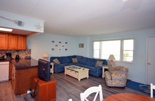 Midtown Ocean City Condo | Cozy, stylish 2 bedroom condo with free WiFi just a short stroll to the beach among the excitement of downtown only a few streets from the boardwalk!