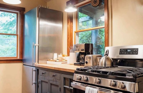 Lanesville Cabin | Creekside Cabin with Hot Tub & Wood-Burning Stove