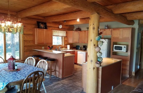 Columbia Falls Ski Chalet | Custom Log Home bordering Glacier Park and North Fork River!