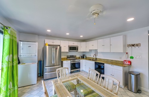 Caine Woods Apartment | Deck w/Canal Access: Ocean City Townhome
