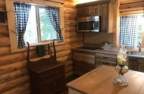 Kila Cabin | Deer Cabin at +WM Ranch Near Glacier National Park, Peaceful log cabin in the woods, yet only 20 min.