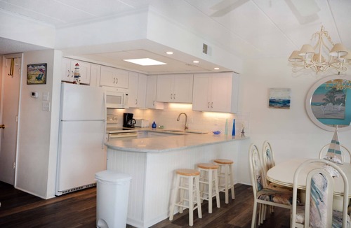 North Ocean City Condo | Delightful Ocean Block Condo in an Uptown Location Walking Distance To Northside Park that has an Elevator and Two Parking Spaces that is Only a Short Walk to the Beach!
