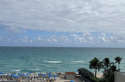 Sunny Isles Beach Condo | Direct Ocean View Condo wBalcony,Kitchen + Pool, Gym in a Beachfront Building.