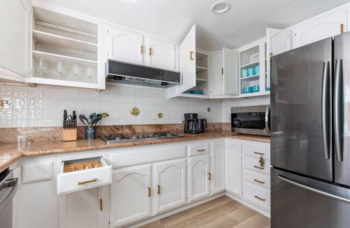 Rowland Heights House | Discover spacious comfort in this 4BR, 3-bath retreat featuring a sun deck, dedicated workspace, and thrilling ping-pong entertainment.