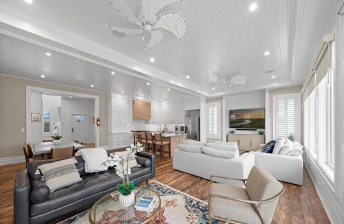 Stone Harbor House | Discover the epitome of coastal living in this exceptional bayfront residence, a true gem boasting.