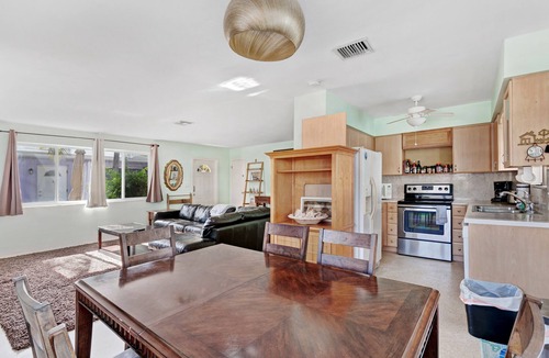 North Beach House | Dog-friendly duplex with communal patio, dining area, & grill