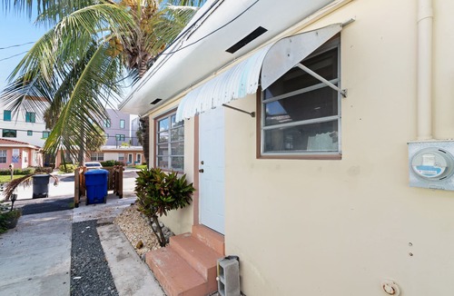 North Beach House | Dog-friendly duplex with communal patio, dining area, & grill