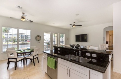 Wilton Manors House | Eco-friendly 100% solar home with 42 ft salt water, lap pool/spa on new river
