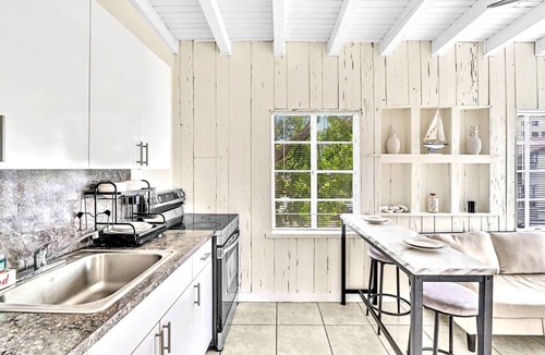 Northeast Miami Apartment | Endless Summer Riverfront Manatee Serenity