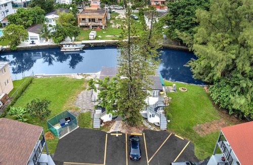 Northeast Miami Apartment | Endless Summer Riverfront Manatee Serenity