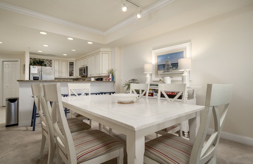 Ocean City Condo | Enjoy a large, spacious designer unit with all the extras plus an indoor pool, outdoor pool, fitness room, assigned parking and shops on the ground level.