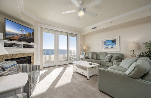 Ocean City Condo | Enjoy a large, spacious designer unit with all the extras plus an indoor pool, outdoor pool, fitness room, assigned parking and shops on the ground level.