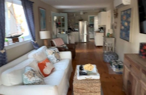 East Falmouth House | Enjoy the lake, dock, beach, large grounds, or renovated home. New ductless AC.