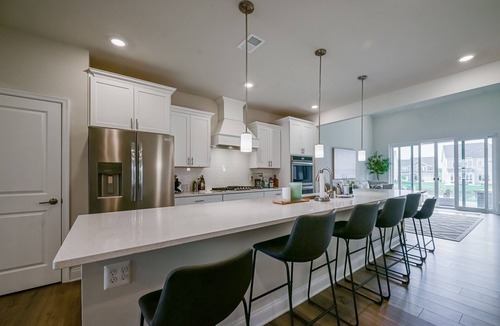 Long Neck House | Enjoy this new modern coastal 4BR/ 3.5 Bathroom townhome located at the Peninsula.