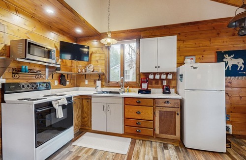 Woods Bay House | Enjoy two separate cabins, pet friendly, firepit, 5 min to Lake, fly-fishing