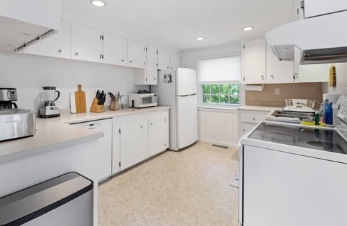 East Orleans House | Escape and Relax in this East Orleans home with magnificent in-ground heated pool