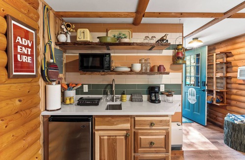 Martin City Cabin | Escape to 'Take a Hike,' a chic 250sqft cabin. Newly remodeled with a modern kitchenette, sleek bath, and curated design. The perfect minimalist sanctuary for solo explorers or couples. Fresh, stylish, and ready for your next adventure!"