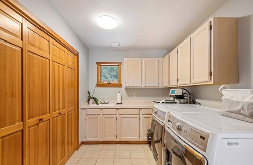 Clark Fork House | Expansive Riverfront Lodge with Dock, Game Room, Bar & Spacious Deck!