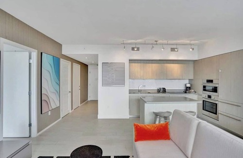 Hollywood South Central Beach Apartment | Experience coastal elegance with breathtaking bay views, modern décor, and unparalleled luxury