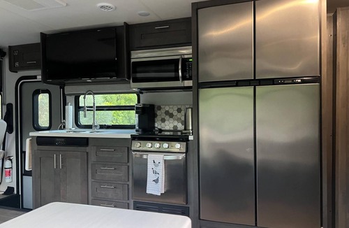 Parkland House | "Experience Enchantment: Book Your Dream Stay at The Magic Motor Home Today!"