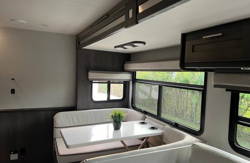 Parkland House | "Experience Enchantment: Book Your Dream Stay at The Magic Motor Home Today!"