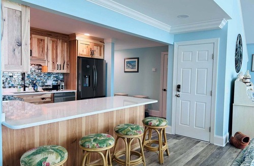 Holden Beach House | Experience oceanfront luxury at Serenity's Star, a spacious 4BR home in Holden Beach.