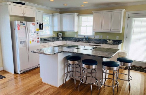 Holden Beach House | Experience oceanfront luxury at Sweet Dreams, a spacious 4BR retreat in Holden Beach.