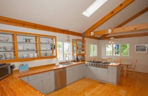 Croatan Beach House | Family-Friendly Sail Away Home with Billiard and Built-in Spa on the Deck by RedAwning