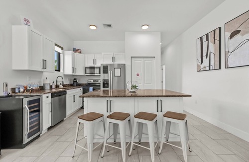 West Park House | Family Fun Retreat-Oasis Fenced Yard, Pool, Game Room, BBQ & Baby Ready