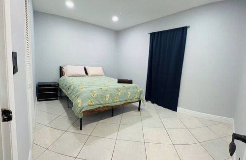 Opa-Locka House | FIFA Stay 2BR Home 11 Min to Hard Rock Stadium.