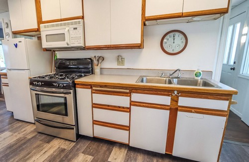 Somers Boat Rental | FLOATING HOUSE on Flathead Lake, kayaks, rooftop decks, watercraft rentals!