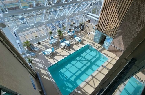 Northeast Virginia Beach Condo | Four Sails - Oceanfront and City View Balconies!