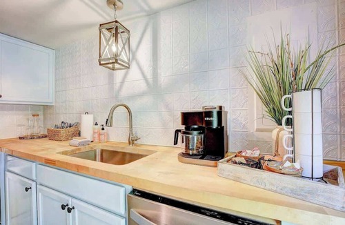 Lusby House | Garden Cottage · Garden Cottage - Fire Pit and Grill near Beaches