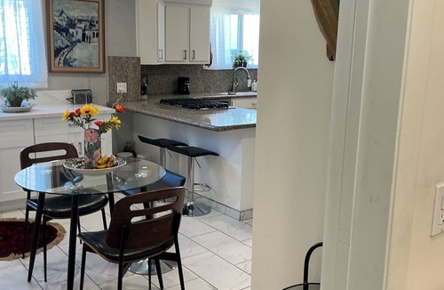 Mid City House | Garden with two hundred fruit trees and swimming pool