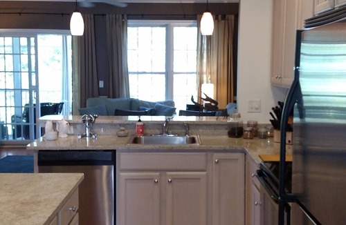 Rehoboth Beach Condo | Gated Community: Top Corner Unit, Screened Porch Facing Woods, Beautiful Pool