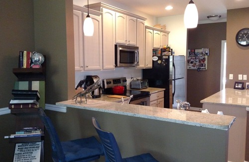 Rehoboth Beach Condo | Gated Community: Top Corner Unit, Screened Porch Facing Woods, Beautiful Pool