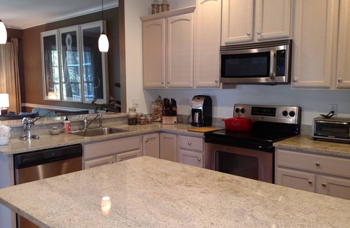 Rehoboth Beach Condo | Gated Community: Top Corner Unit, Screened Porch Facing Woods, Beautiful Pool