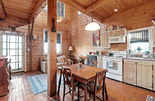 Fredericksburg Cabin | Gorgeous Rustic Log Cabin with Fire Pit and Grill near Top Wineries in Fredericksburg, Texas