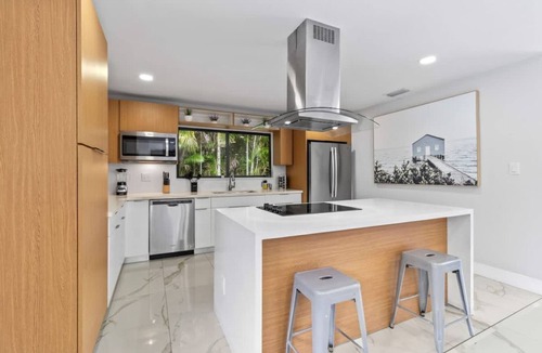 North Miami Beach Villa | Heated Pool Villa in Miami by Glam Homes