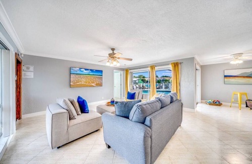 Coral Ridge Isles House | Heated Pool! Waterfront+Pool Tble+1 Mile To Beach!