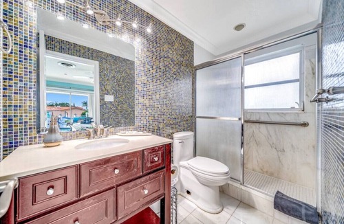 Coral Ridge Isles House | Heated Pool! Waterfront+Pool Tble+1 Mile To Beach!