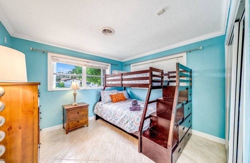 Coral Ridge Isles House | Heated Pool! Waterfront+Pool Tble+1 Mile To Beach!